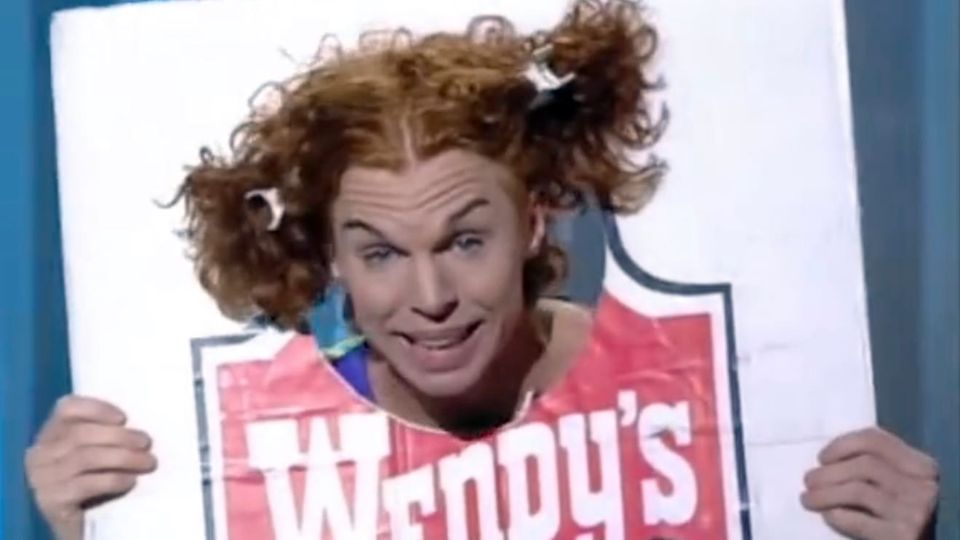 Carrot Top doing the thing with the hair so they look like the Wendy's Wendy and posing with a Wendy's logo with the Wendy cut out and the Top's head in a hole replacing it.