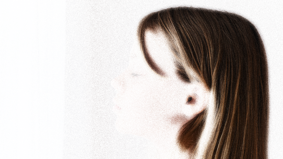 A child's head viewed in profile. The child's face is very faint, fading into the pale background.
