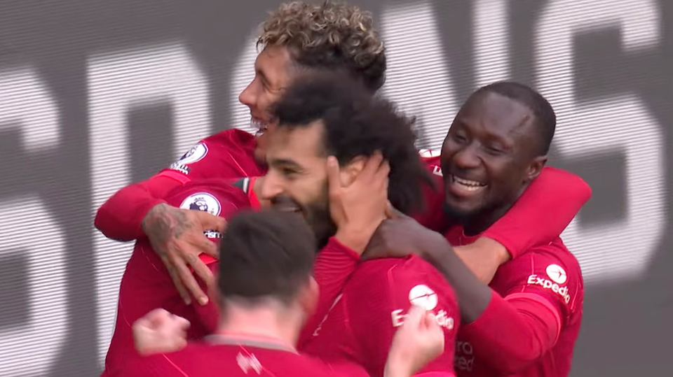 Mo Salah swarmed by teammates after goal 