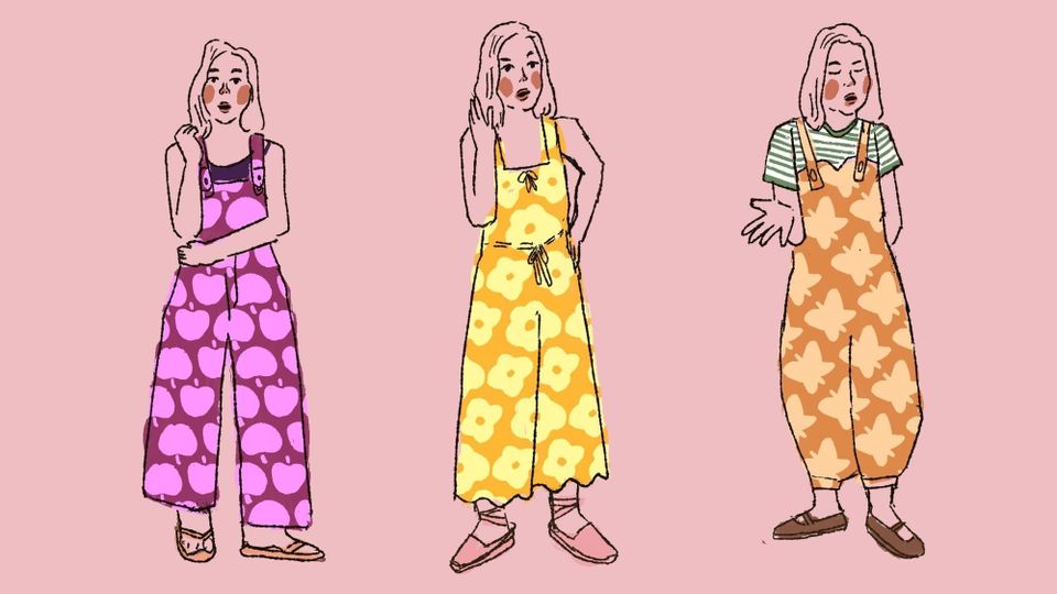 Three women in vidily-colored wide-legged overalls