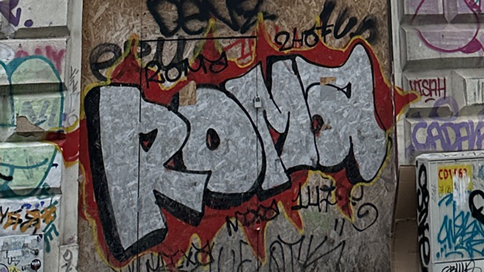 Detail of graffiti on building: ROMA