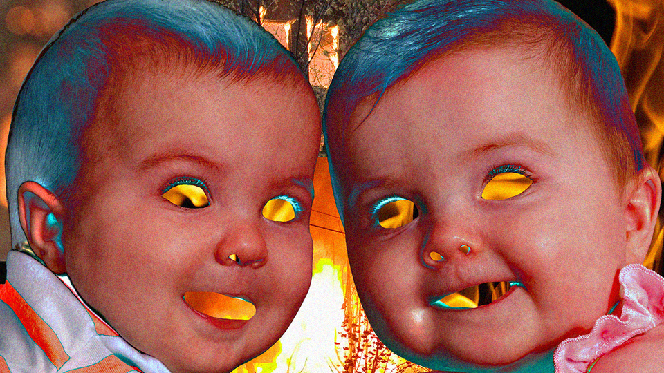 Twin babies in front of a buidling engulfed in flames and the flames are in their eyes and mouth and they are smiling.