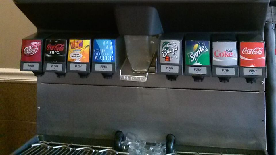 Self-service fast food soda fountain feat. Dr. Pepper, Coca-Cola Zero, HiC, Water, Ice, Barq's, Sprite, Diet Coke, and Coca-Cola