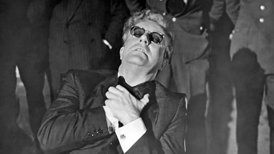 A mad scientist with alien hand syndrome struggles to avoid strangling himself