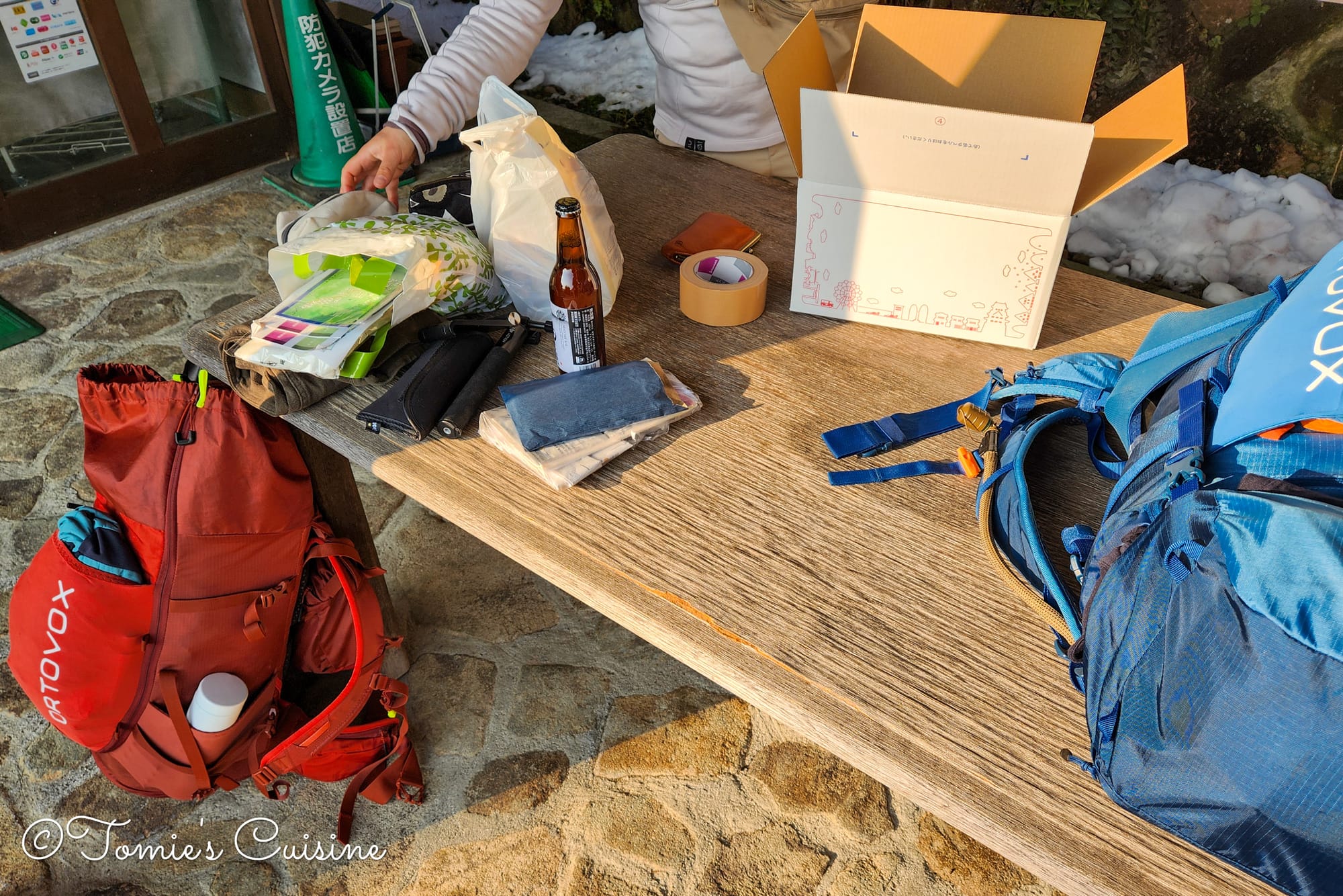 Packing a box at the post office in Magome to send things home