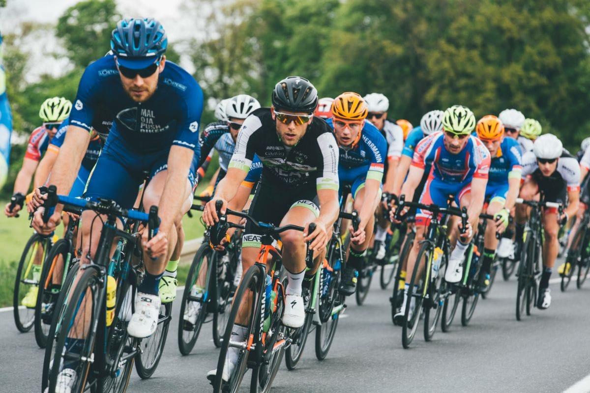 cycling competition with lots of cyclists 
