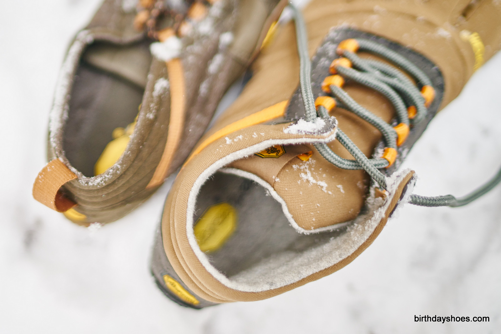 Trek Ascent LR and Trek Ascent Insulated. Note the difference in collar padding and lace system vs traditional laces