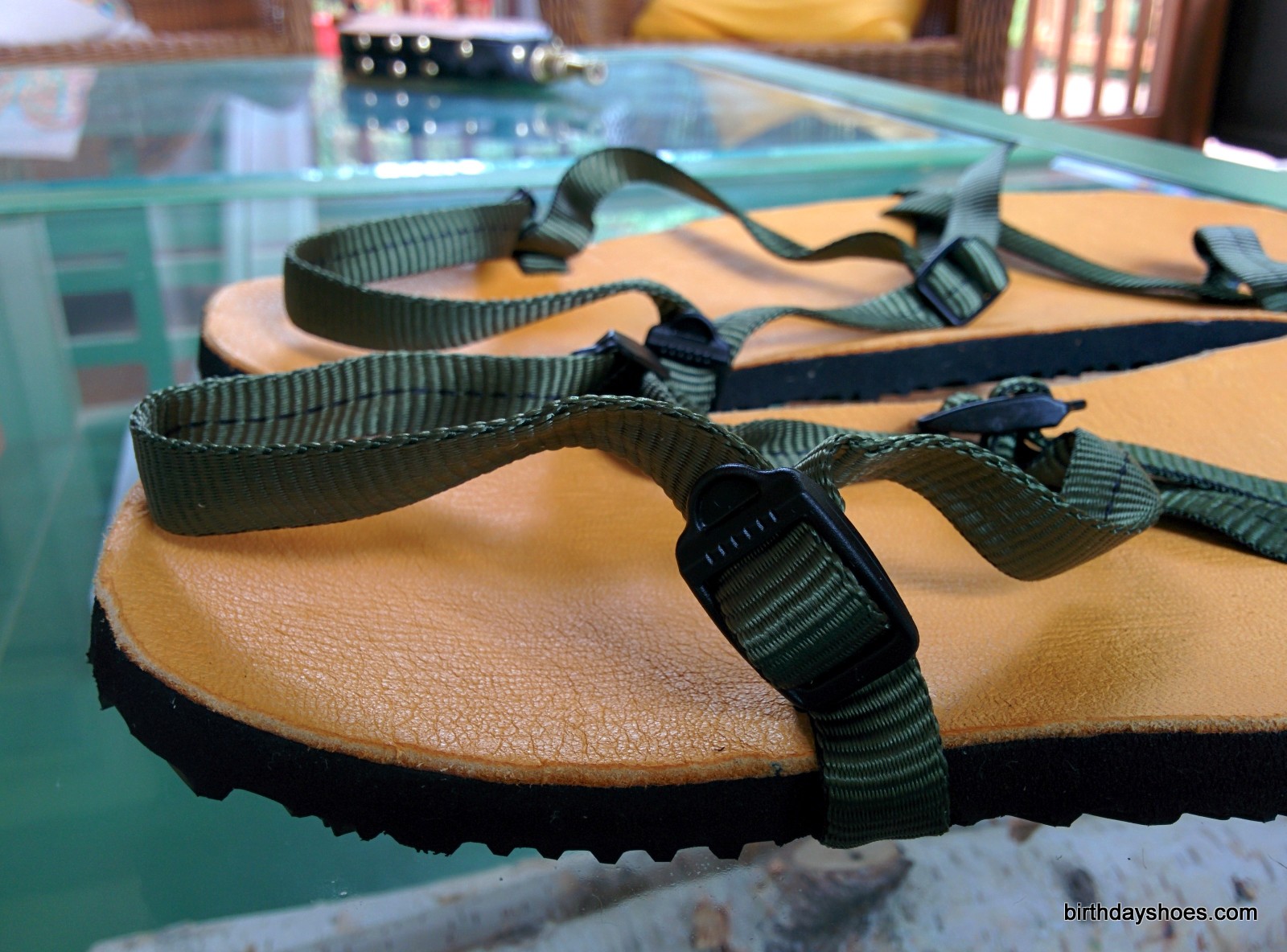 There are three of these ladder tensioners that help adjust the fit.  They also work as webbing controllers.