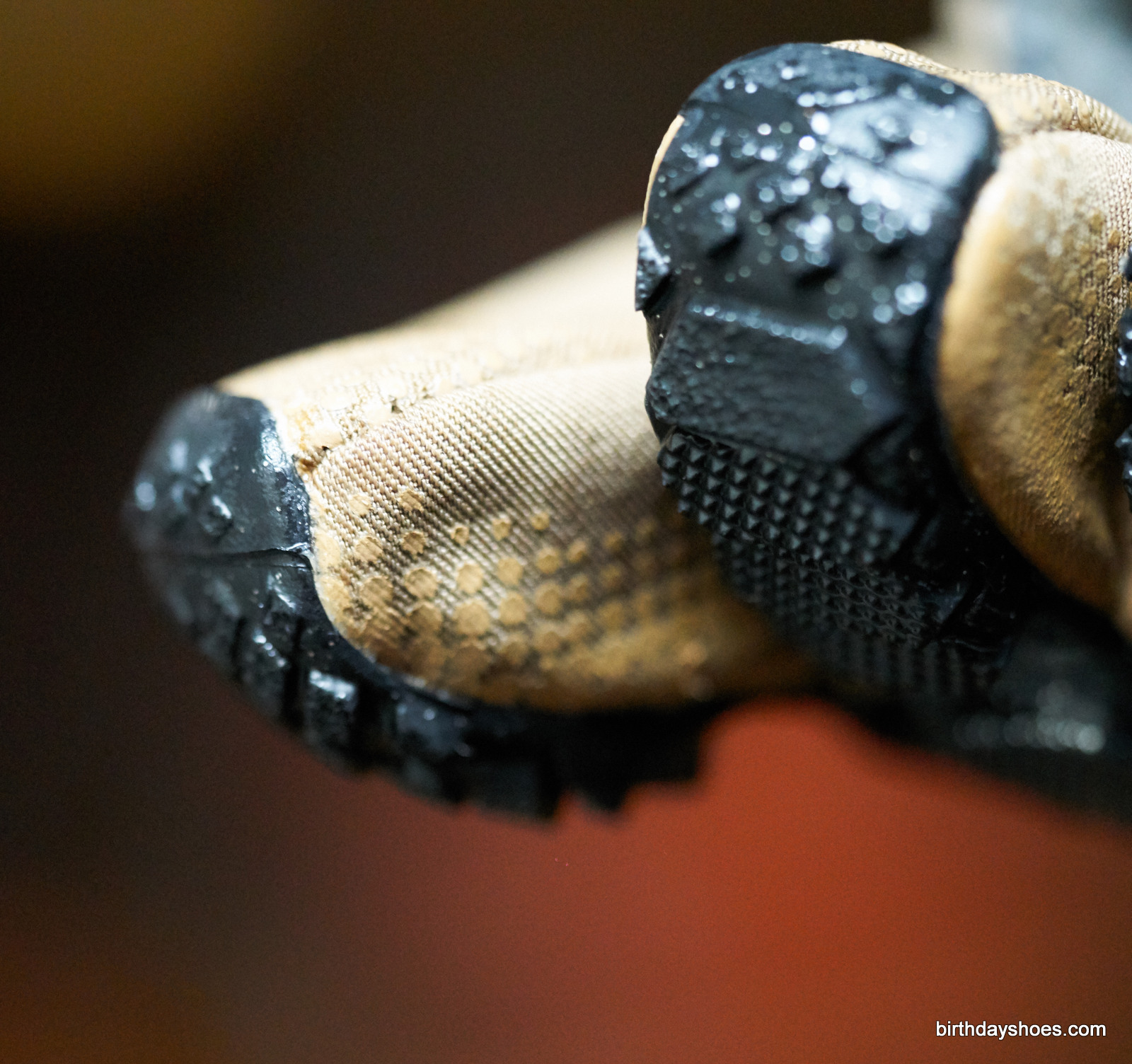 The rubber lugs will provide roughly 4mm of lift before you start soaking the water-resistant, but not water-proof, uppers 