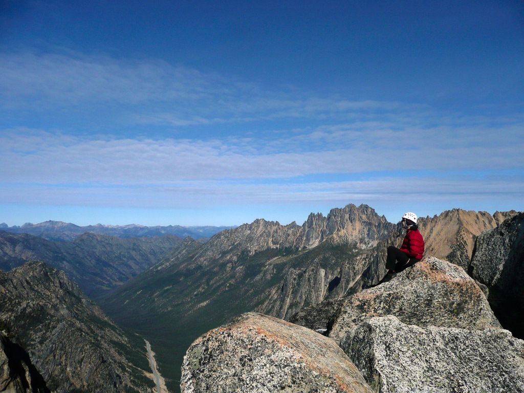 Maria Climbs to the South Arete Summit in her KSOs