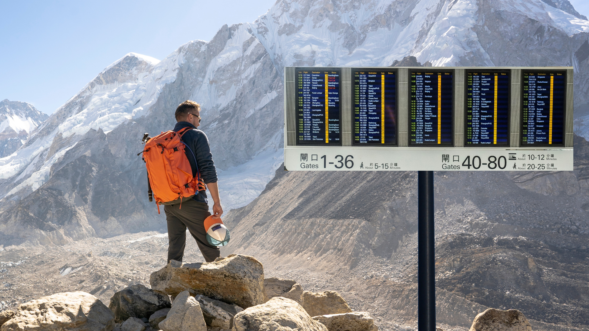 A mountain climber looks at an airport/arrivals departure board set up at foot of the mountain.