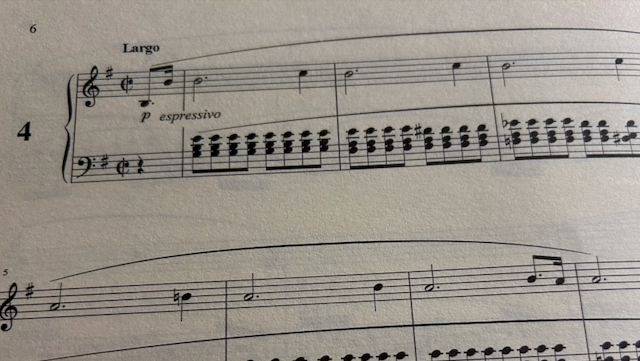 A photo of the sheet music for the first few bars of Chopin’s Prélude Opus 28, No. 4 in E Minor.