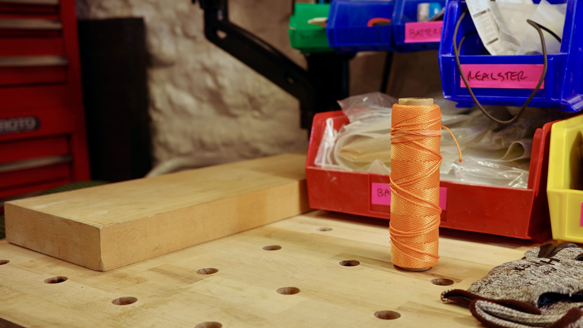 A spool of orange mason's twine