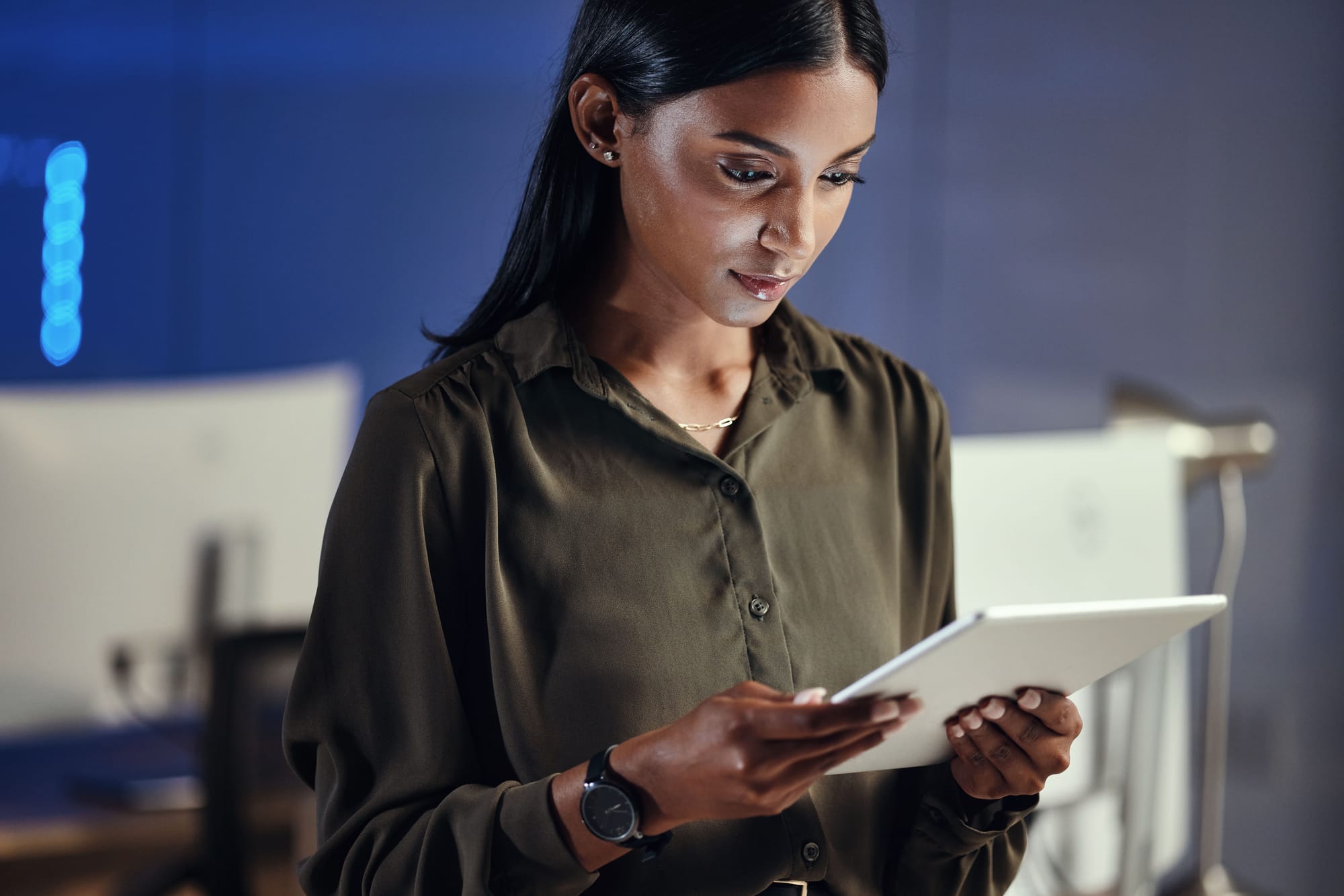 woman choosing software on ipad