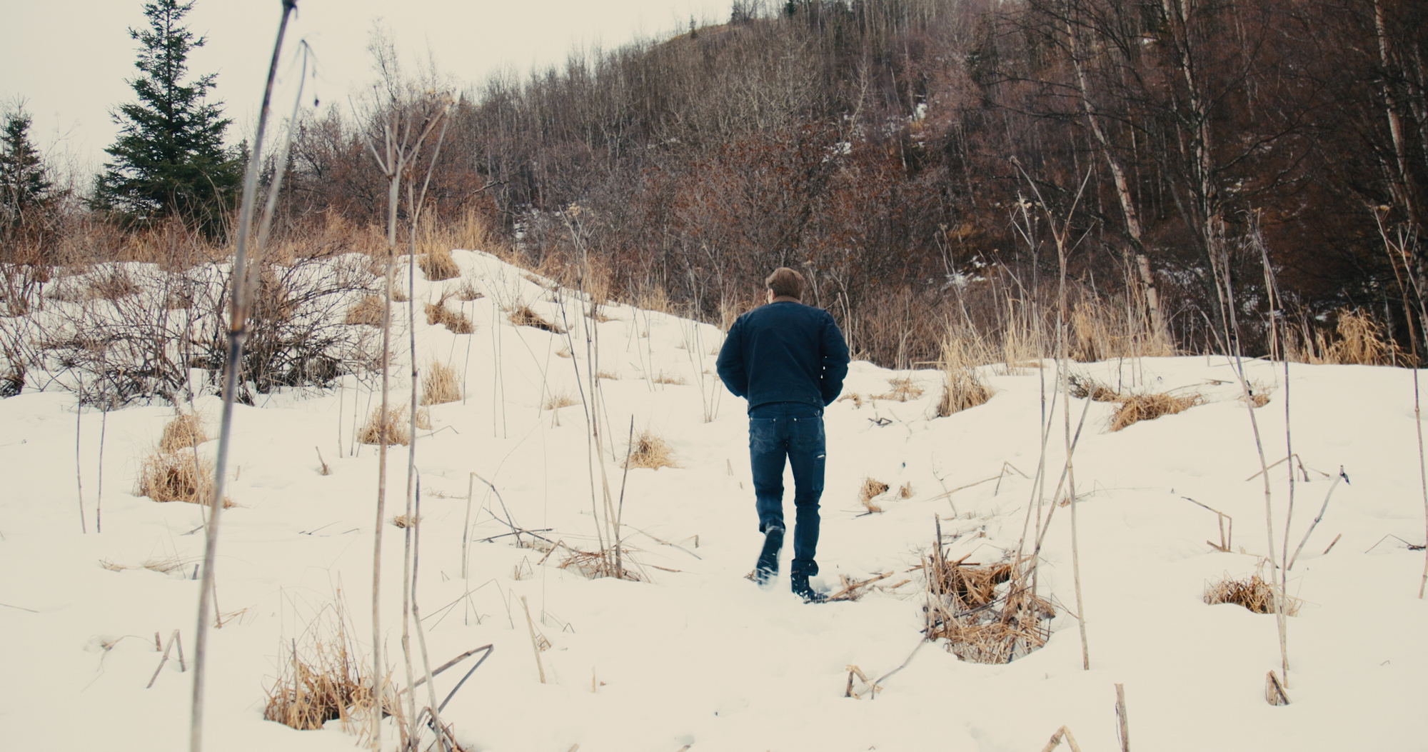 Brian walking in snow Alaska