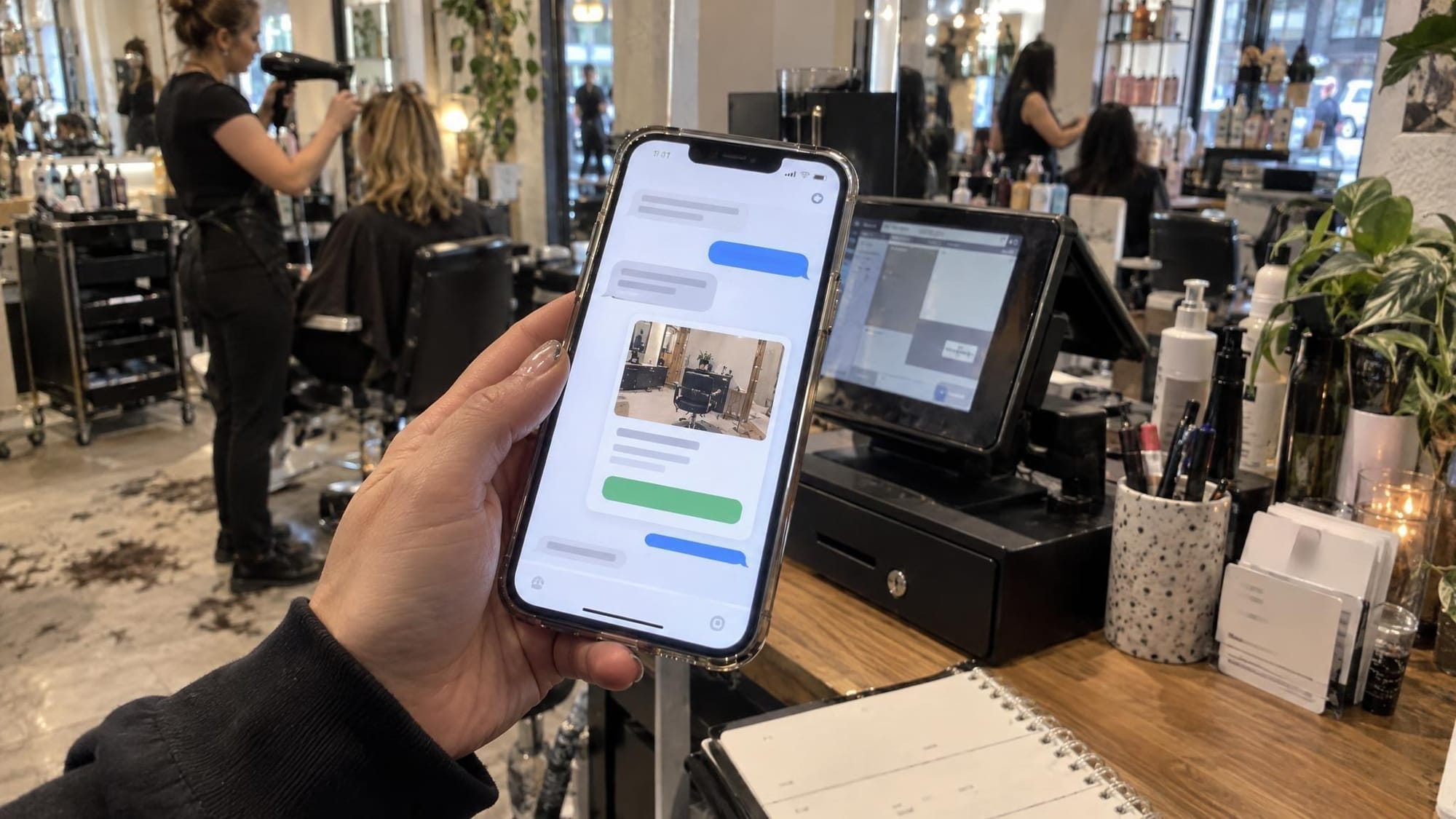 A booking card inside a chat, at the salon's front desk A booking card inside a chat, at the salon's front desk