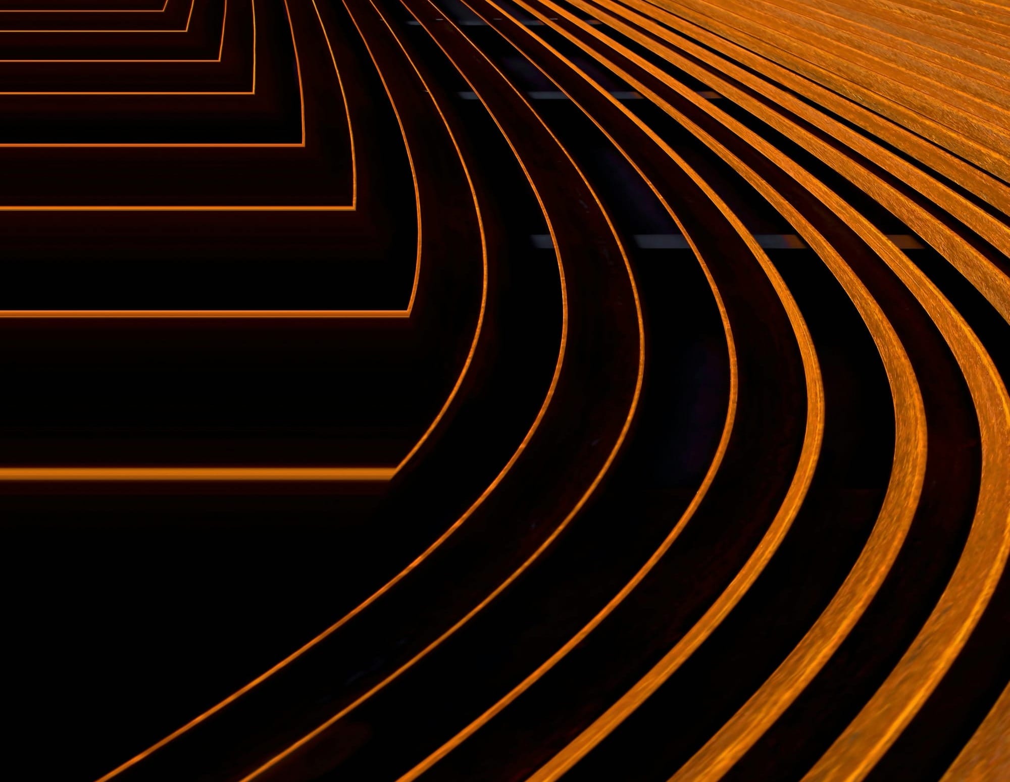 An abstract of curved, rusted metal