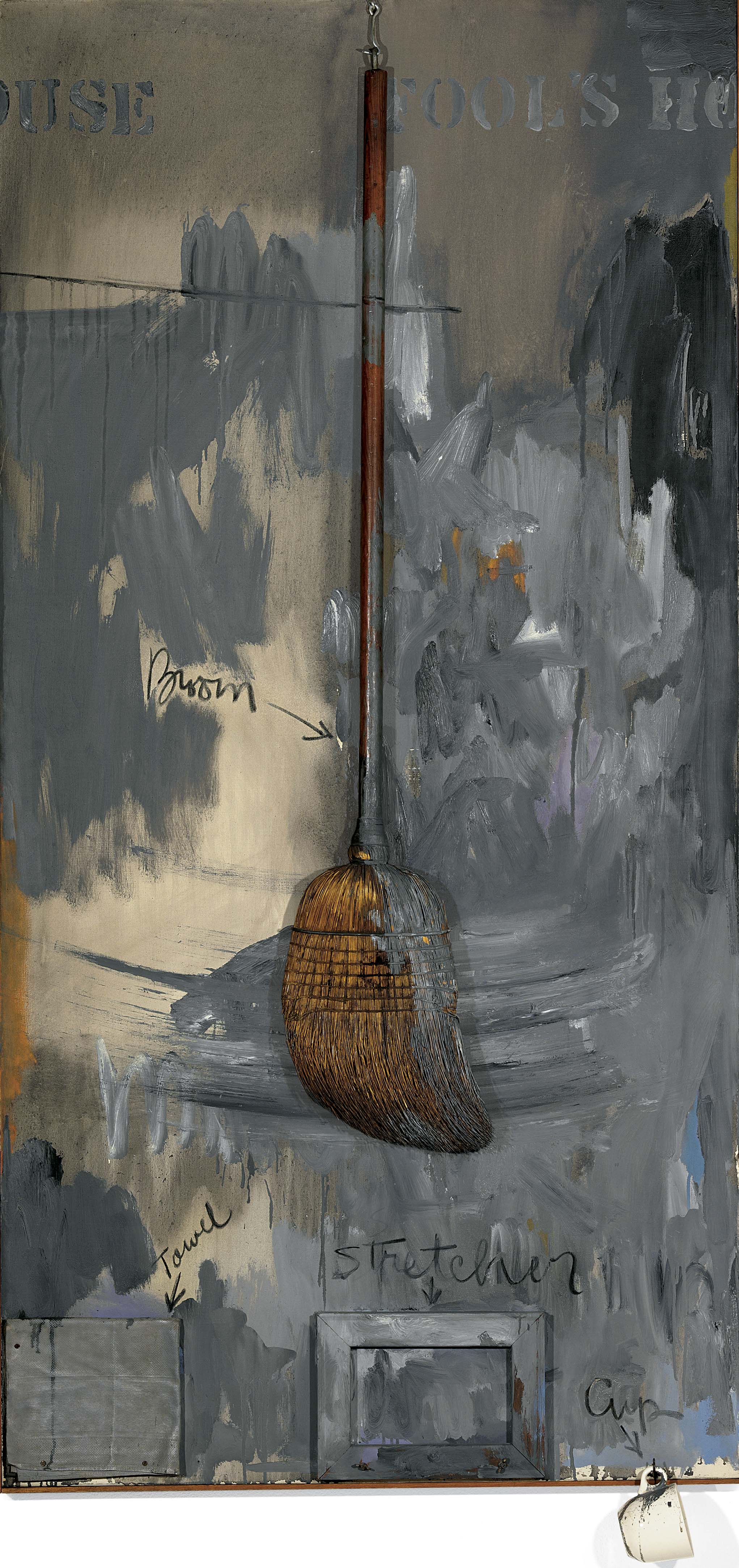 Jasper Johns, Fool's House, 1961-62. Oil on canvas with broom, sculptural towel, stretcher and cup, 182.9 x 92.5 x 11.4 cm. Private collection