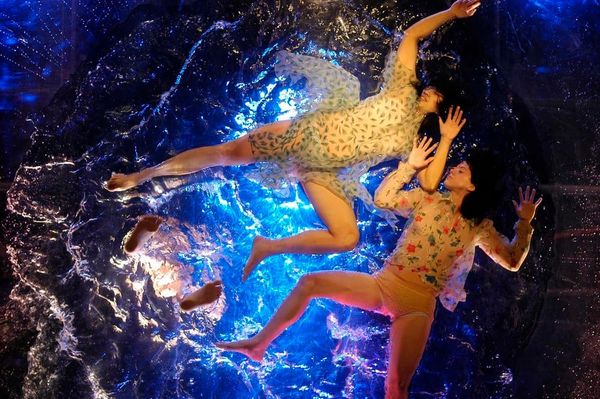 Not waving but possibly drowning