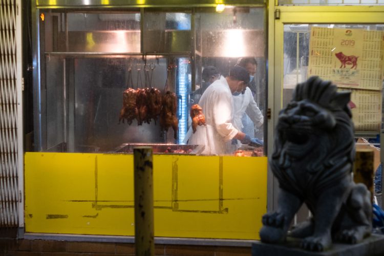 Cooks in a chinese BQQ; Kingsway, Vancouver