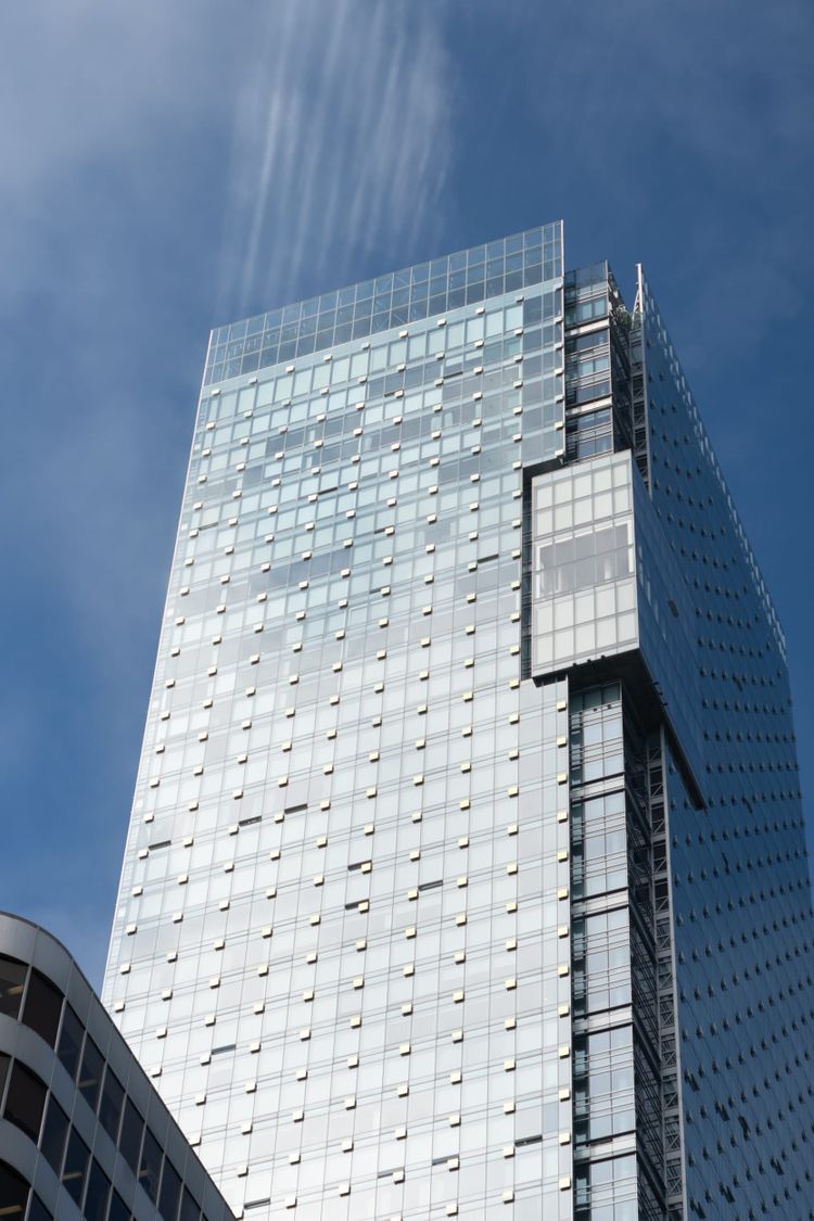 Glass and light combine to sculpt the low clouds; City Centre, Vancouver