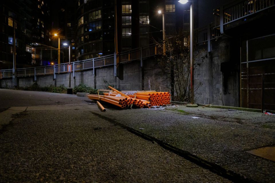 Empty lot and orange pipes; Granville, Vancouver