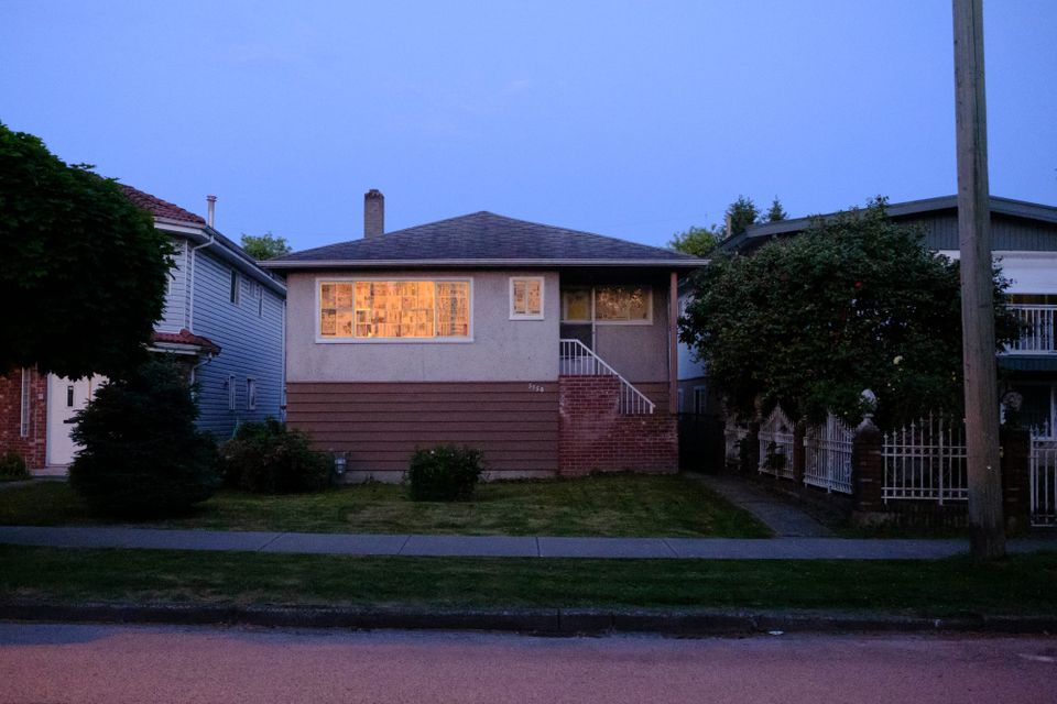 Glass glowing gold; Collingwood, Vancouver