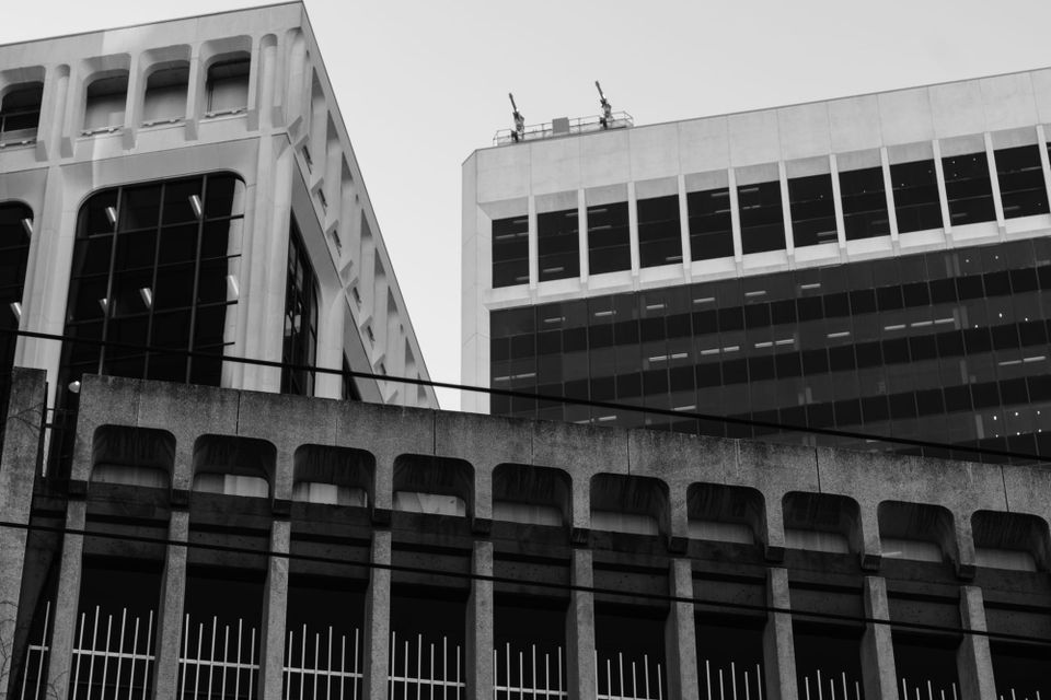 Towers in the city centre, with top of parkade in foreground; Melville Street, Vancouver