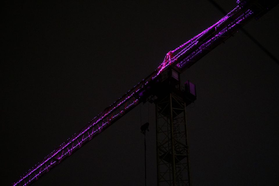 Decorated crane in a new toweer construction; Mount Pleasant, Vancouver