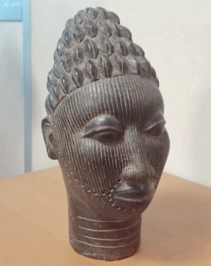 Closeup of the Ife head replica on Mr. Cheminade’s desk.