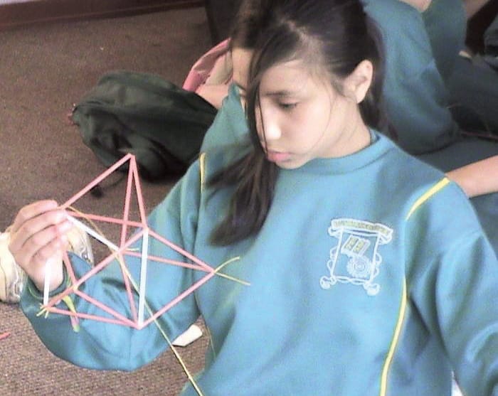 Colombian youth studying geometry