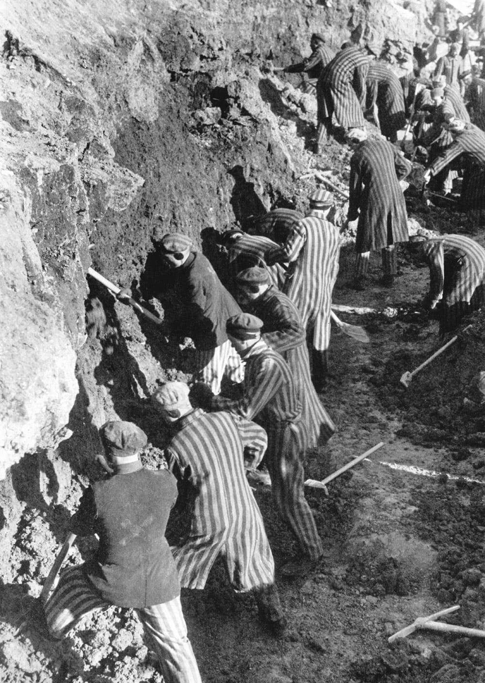 Schacht "solved" Germany's dwindling ability to meet foreign debt-payments by looting the stored-up wealth of German bodies and industrial capacity. Shown: Forced labor at Sachsenhausen concentration camp.