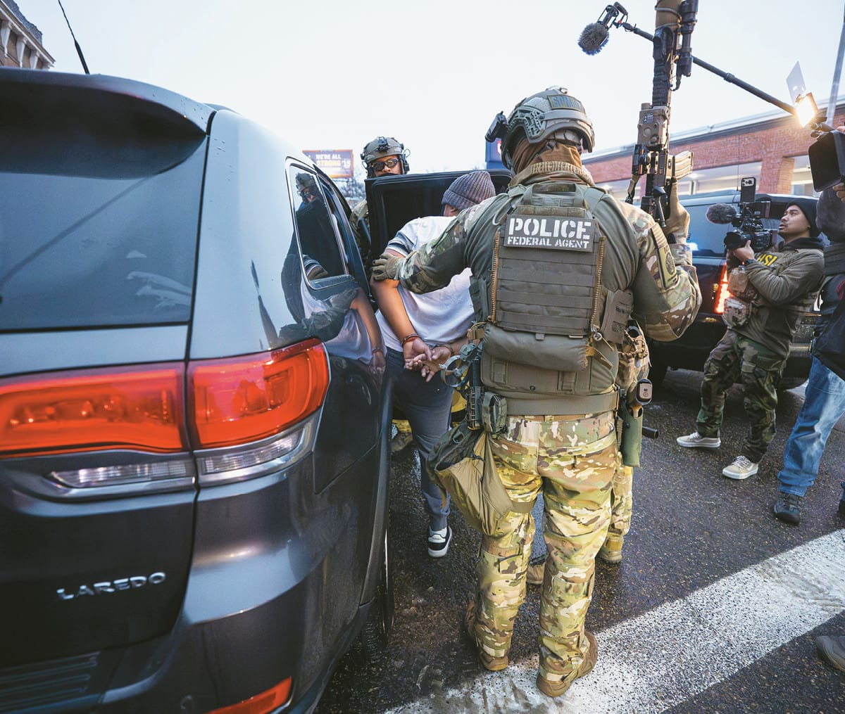 Federal agents of the U.S. Department of Homeland Security make an arrest in Minneapolis, Jan. 6, 2026.