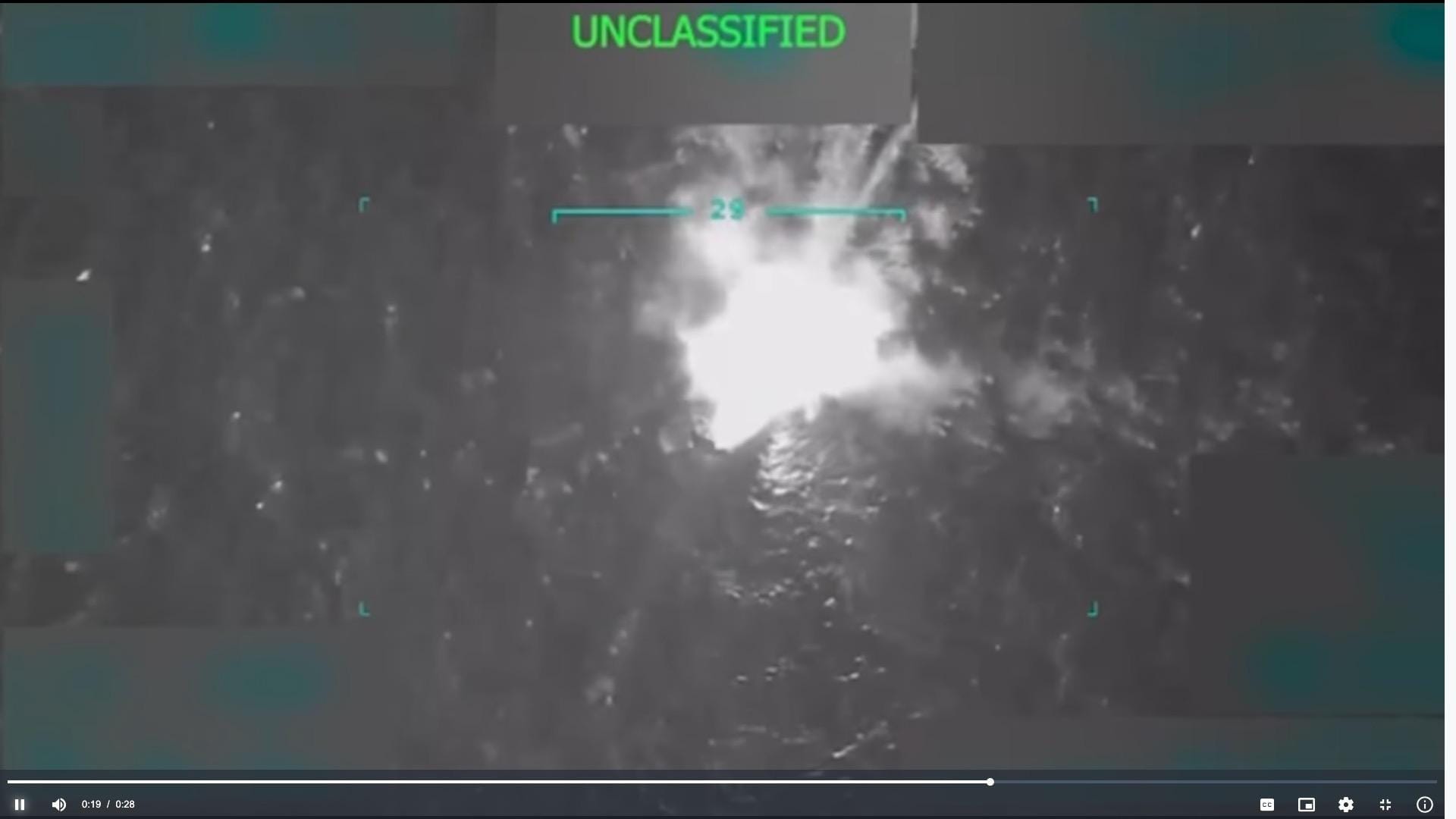 An alleged drug boat being blown-up in the Caribbean by U.S. Southern Command.