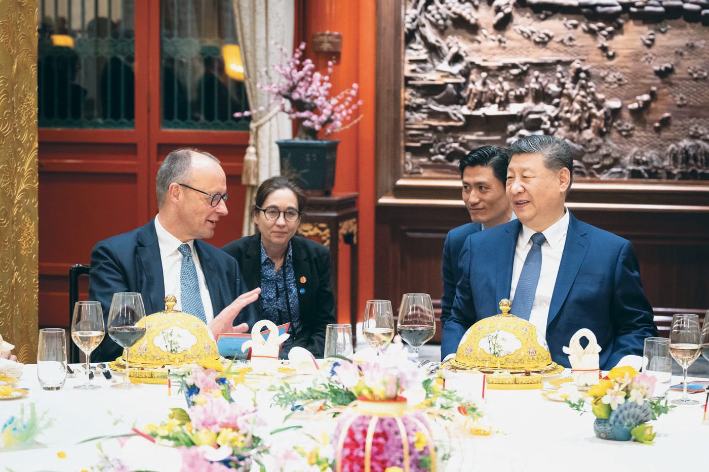 German Chancellor Friedrich Merz in Beijing, China, speaks to Chinese President Xi Jinping, Feb. 25, 2026.