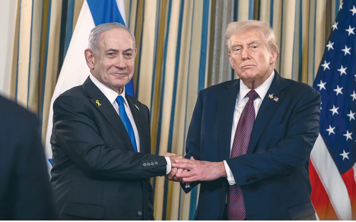 U.S. President Donald Trump (right) shakes hands with Israeli Prime Minister Benjamin Netanyahu at the conclusion of a joint press conference in the White House, Sept. 29, 2025.