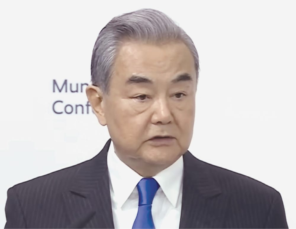 Chinese Foreign Minister Wang Yi speaks at the Munich Security Conference, Feb. 14, 2026.