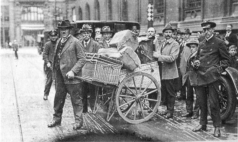 When paper marks inflated to a million to one gold mark in Germany, wages had to be delivered in sacks by hand-cart. August 15, 1923.