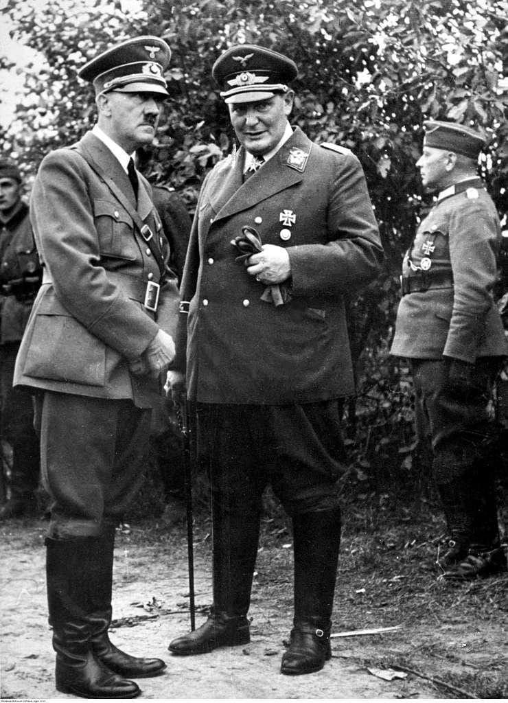 German Chancellor Adolf Hitler in conversation with Hermann Göring, in Oksywie, Poland, 1929. Friedman shares Göring’s economic outlook that there are no limits to monetarist looting of subject populations except those set by defeat in war.
