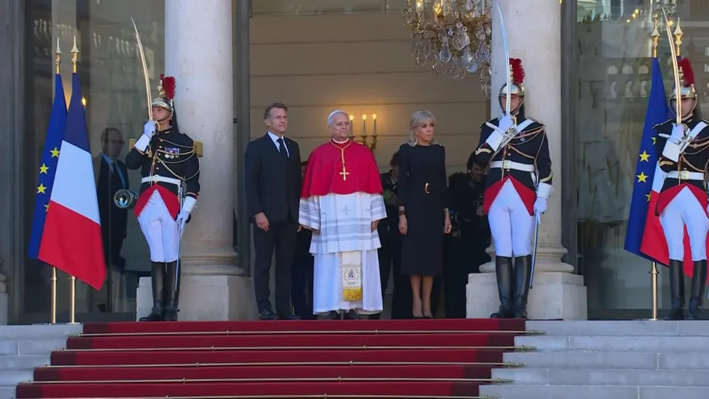 French President Emmanuel Macron and First Lady Brigitte Macron welcome Pope Leo XIV to the Élysée Palace in Paris on September 25, 2026.