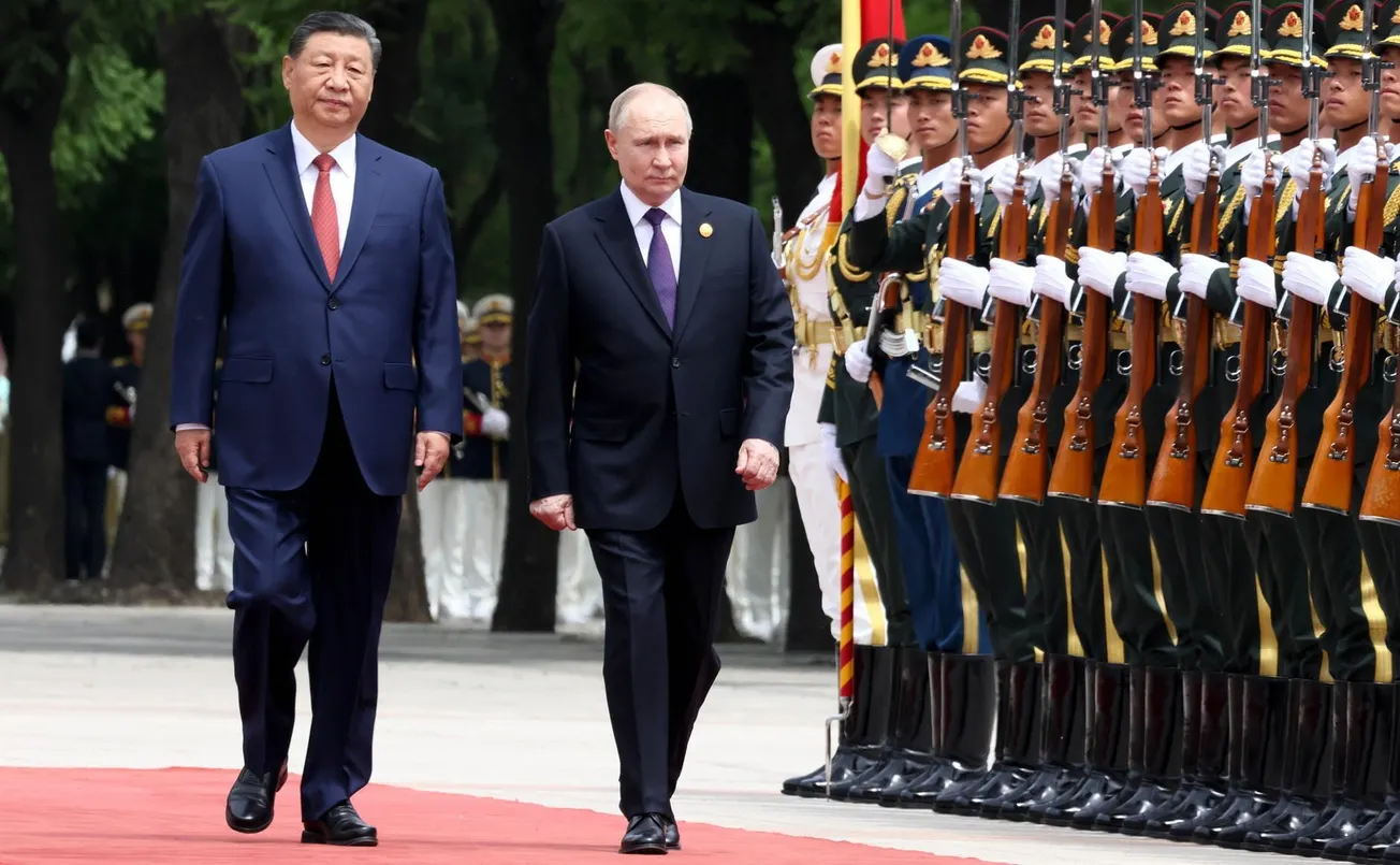 China Says Putin's Visit Symbolizes China-U.S.S.R. Lead in World War II Defeat of 'Militarism and Fascism'