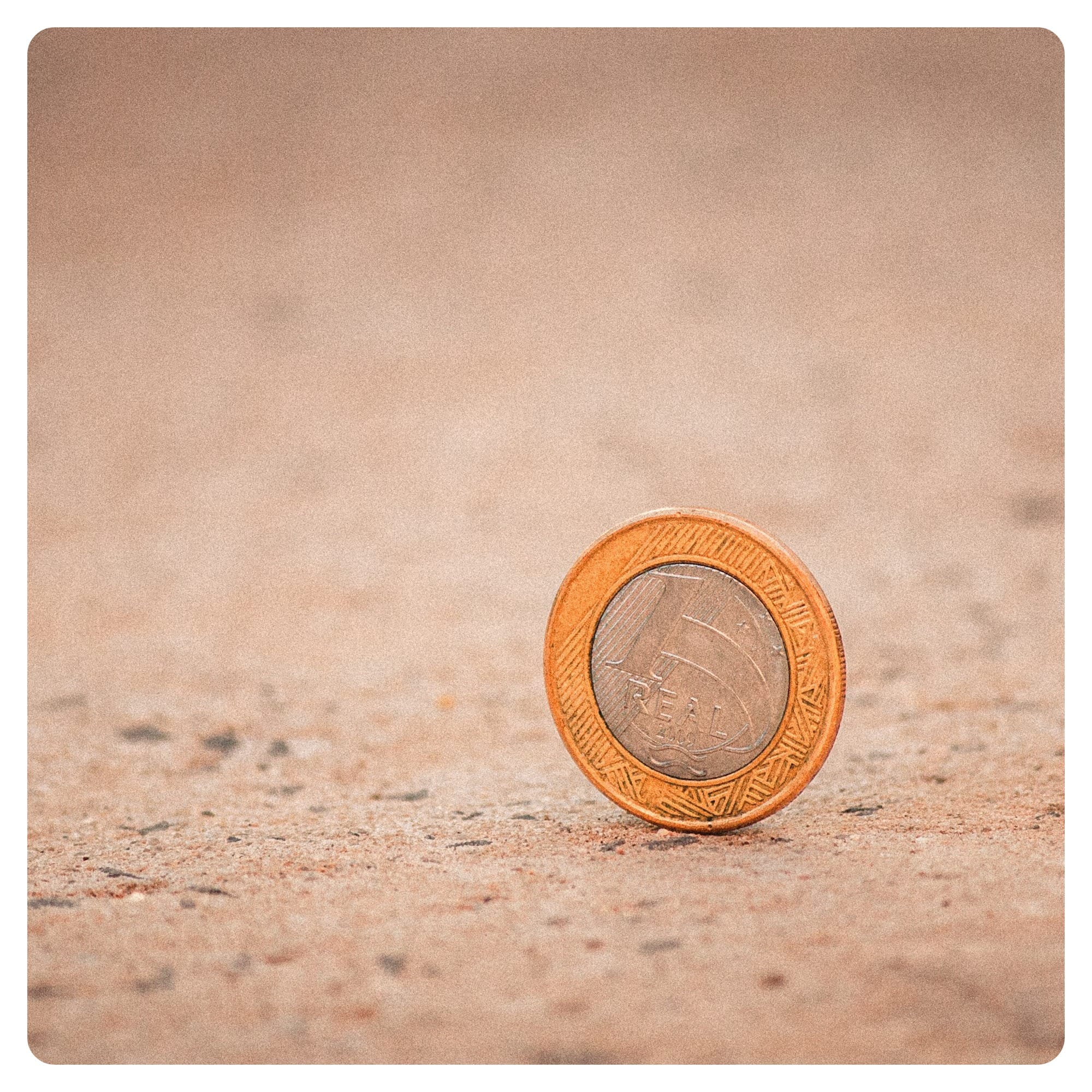 silver and gold round coin