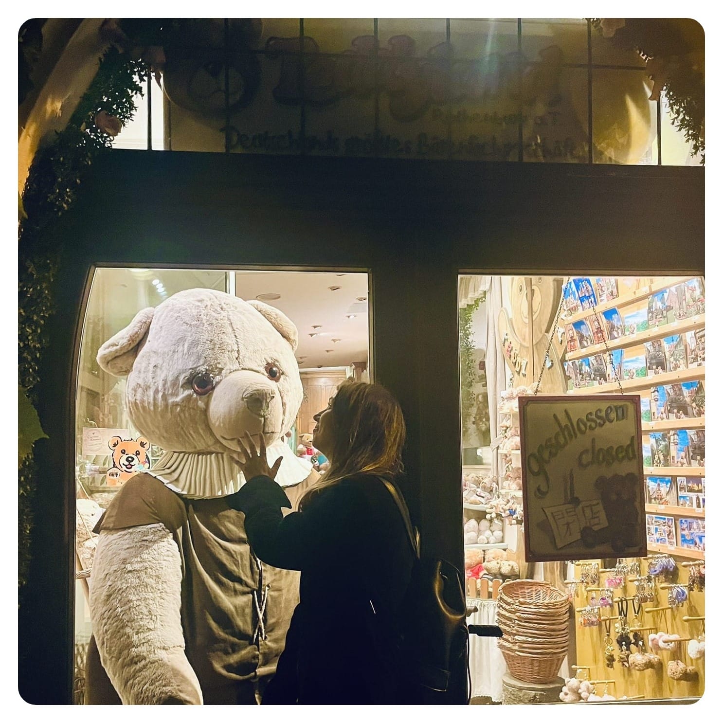 van life vanlavita woman standingnext to giant stuffed bear