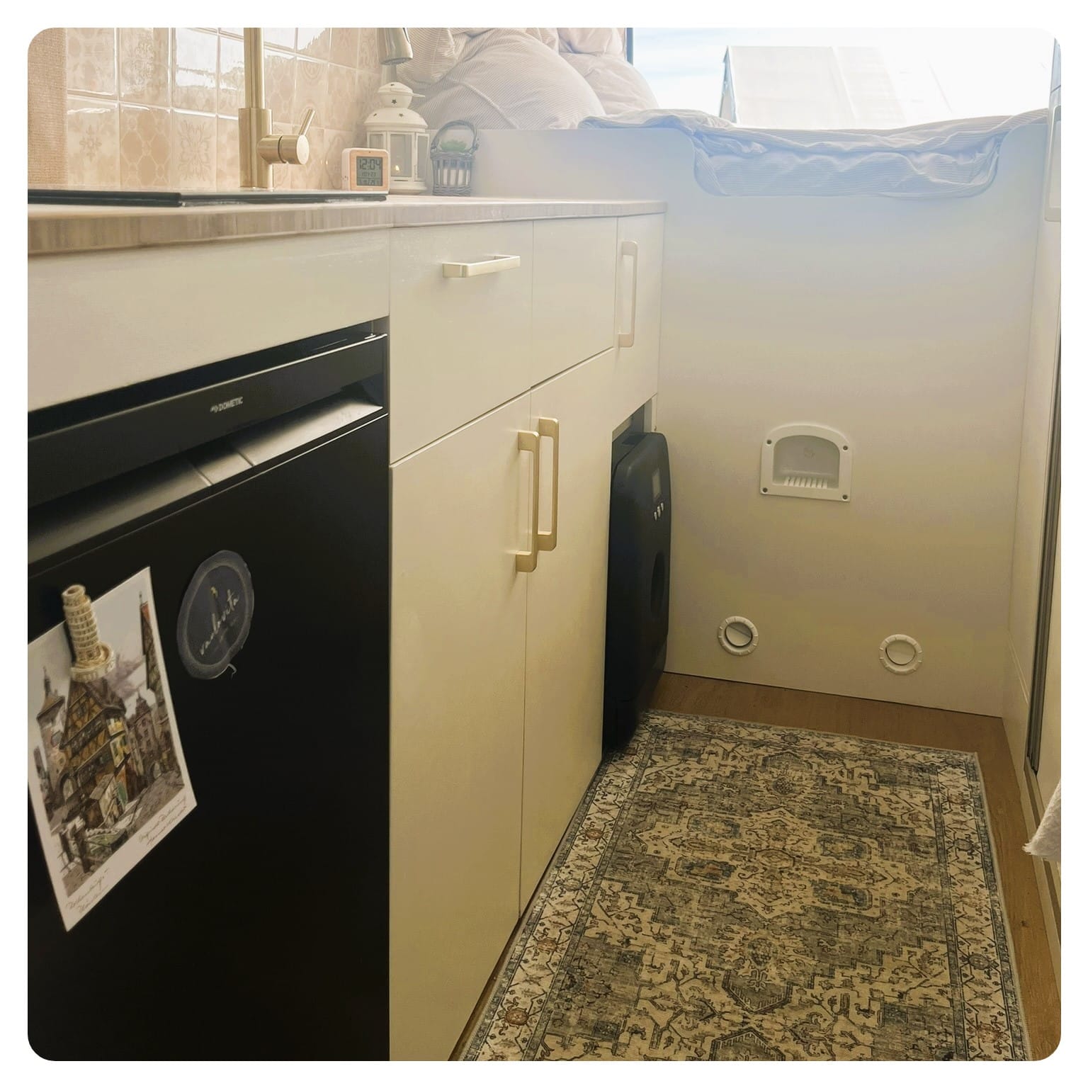 van life interior flooring with boho style rug