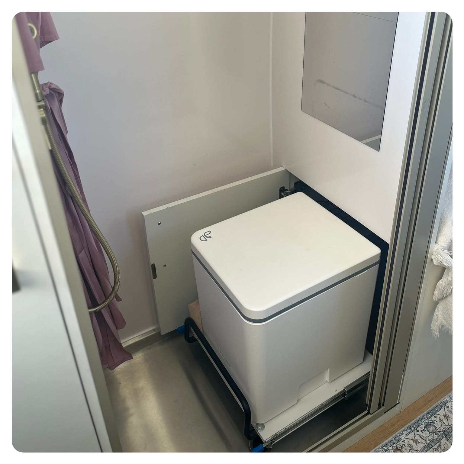 Trelino compost toilet in white colour in vanlavita camper van