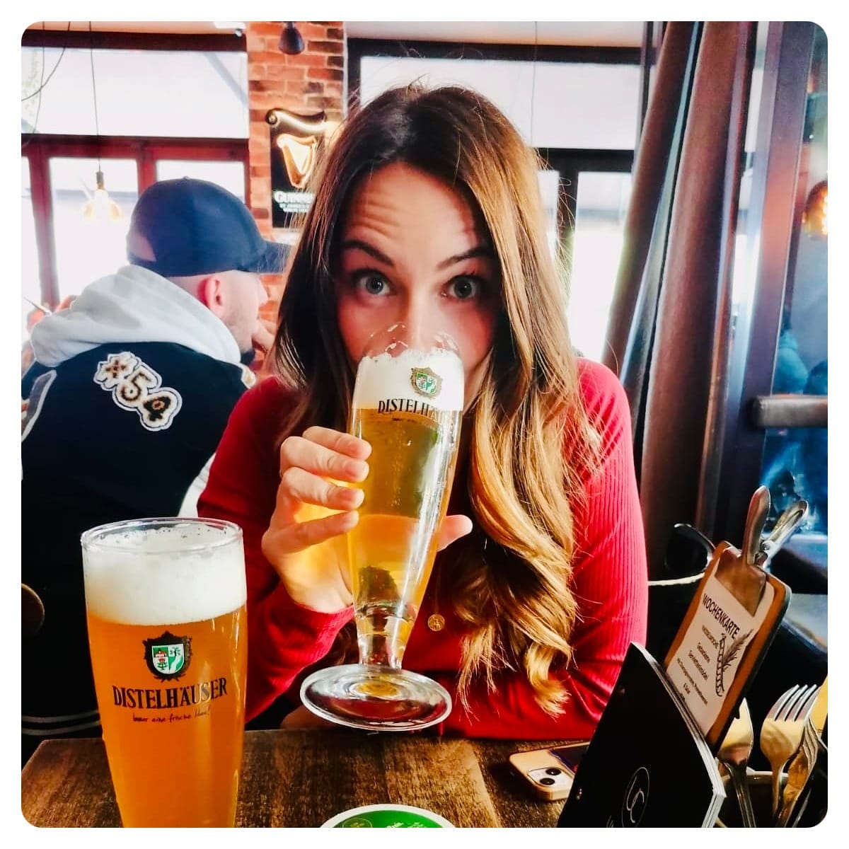 van life vanlavita woman in red tshirt drinking beer