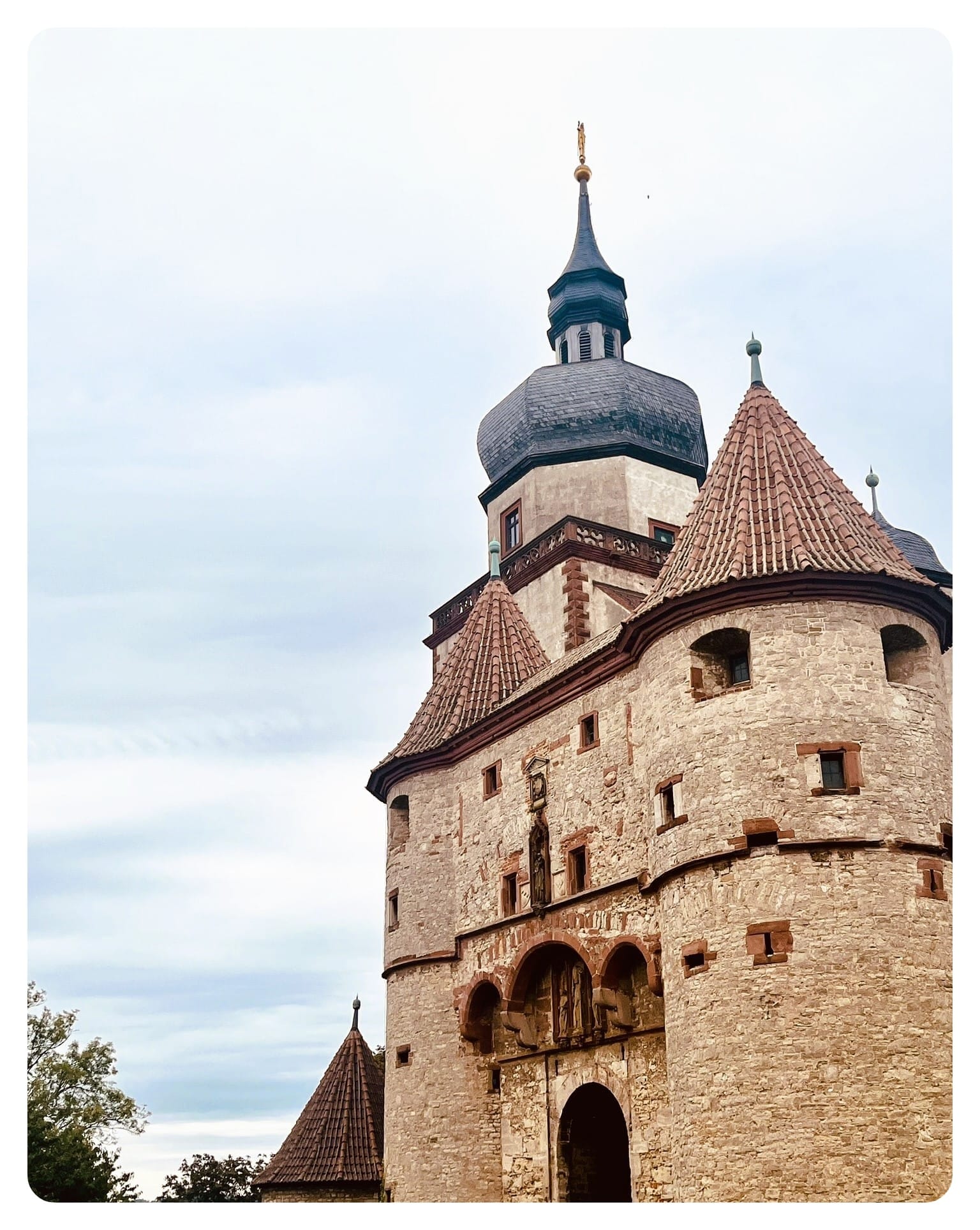 stone fortress building with towers 