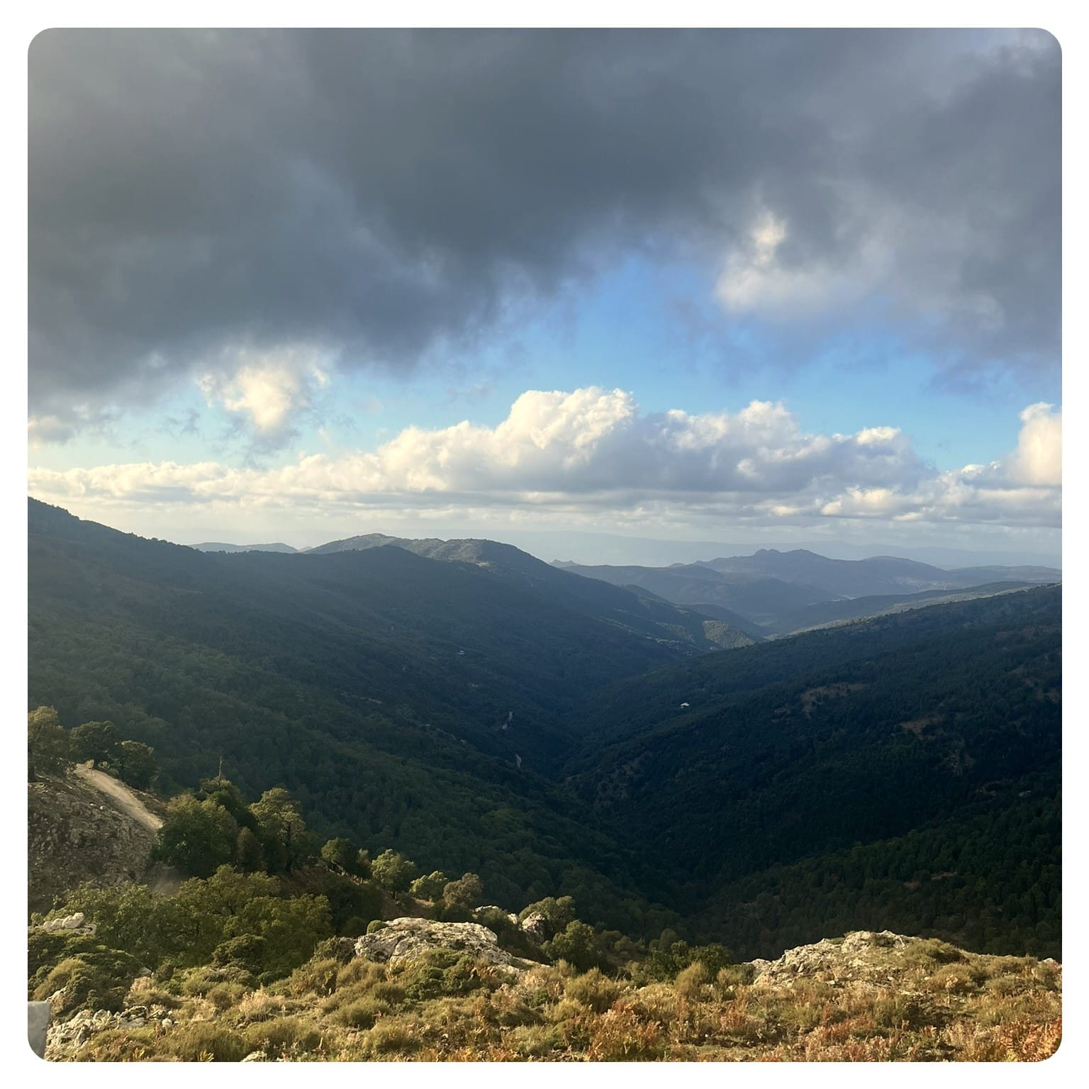 view of mountain range in Sardinia with cloudy sky