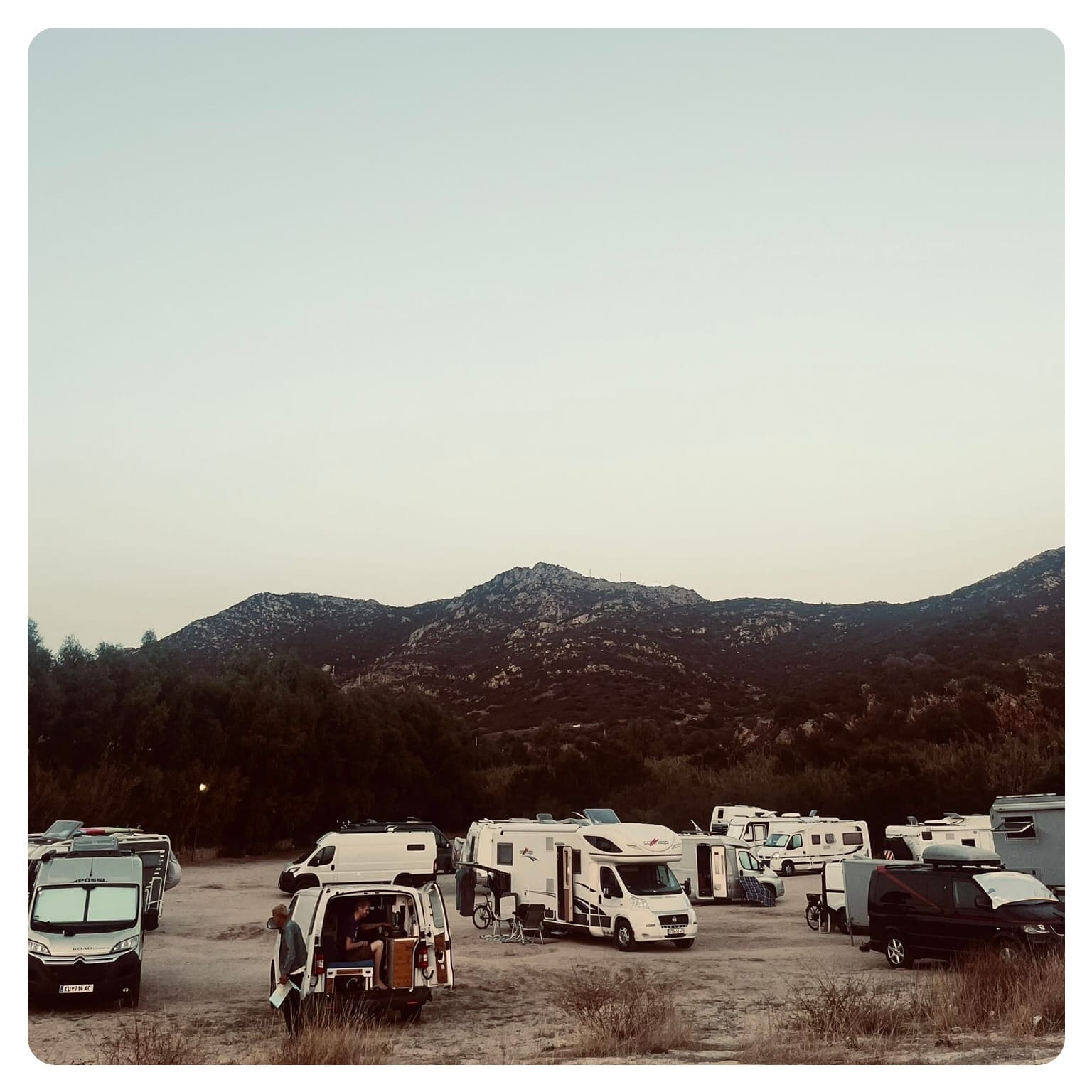 van life vanlavita motorhomes on dirt car park next to the beach