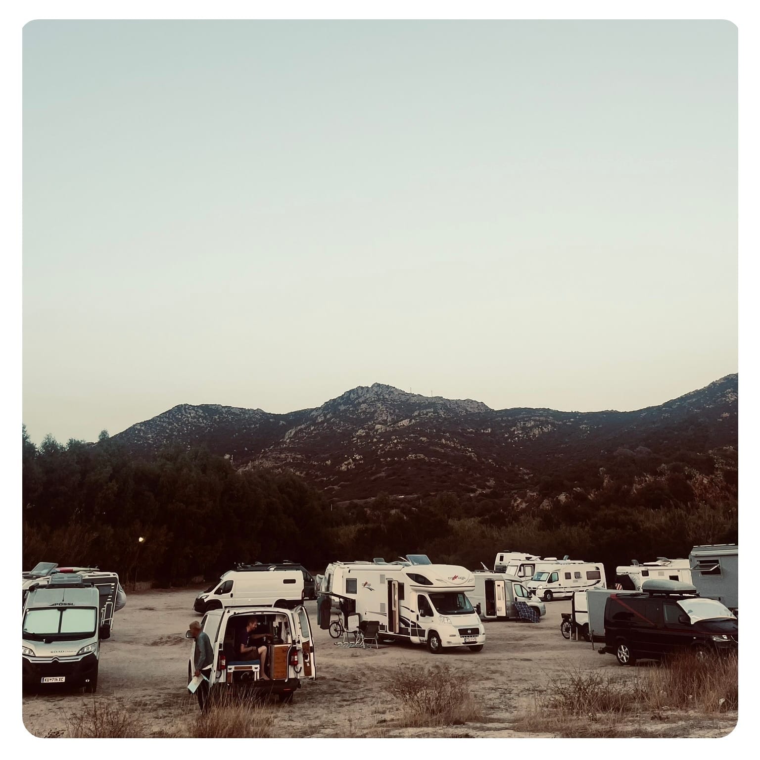 van parked up on motorhome site